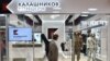 A man walks past the Kalashnikov shop at Moscow's Sheremetyevo airport.
