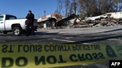 Руйнування будівель, влаштовані протестувальниками, після рішення суду у справі про вбивство темношкірого підлітка у США, містечко Ферґюсон, штат Міссурі, 25 листопада 2014 року