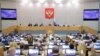 Deputies attend a session at the State Duma in Moscow.