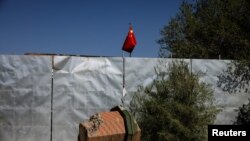 Urumçynyň golaýyndaky Çanji şäherindäki metjidiň minarasynyň bir bölegi. 2021-nji ýylyň 6-njy maýy.