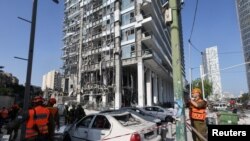 Հինգշաբթի վաղ առավոտյան Ռամատ Գան քաղաքում Իրանի հրթիռային հարձակման հետևանքով վնասված շենքի տեսարանը