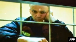 Орусияда камакта жаткан оппозициячыл саясатчы Алексей Навальный.