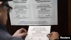 Голосование на референдуме в Латвии, 18 февраля 2012