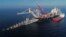 A ship works offshore in the Baltic Sea on a section of the natural gas pipeline Nord Stream 2 from Russia to Germany. The Kremlin-controlled Gazprom energy giant is now trying to find ways to complete the last 160 kilometers of the fuel conduit. (file photo)