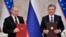 Президент России Владимир Путин и президент Узбекистана Шавкат Мирзиеев. 