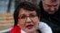 Yulia Galyamina speaks with reporters outside a court building before a hearing in Moscow on December 23, 2020.