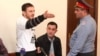 Tigran Arakelian gestures during his trial at the Court of Appeal in Yerevan on October 9.
