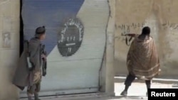 تصویر آرشیف: جنگجویان گروه داعش در شرق میانه. 