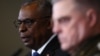 U.S. Secretary of Defense Lloyd Austin (left) and the chairman of the U.S. Joint Chiefs of Staff, General Mark A. Milley, speak to reporters in Germany on January 20.