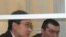 Дмитрий Тян (слева) и Олег Евлоев на скамье подсудимых. Астана, 31 марта 2009 года. 