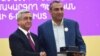 Armenia - President Serzh Sarkisian (L) awards a state medal to businessman Samvel Aleksanian in Yerevan, 26 September 2015.