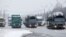 Trucks wait on the Belarusian-Russian border, December 8, 2014