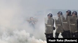 Kosovo Security Forces and NATO troops conduct a joint crowd and riot control drill in Pristina.