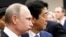 Владимир Путин и Синдзо Абэ 