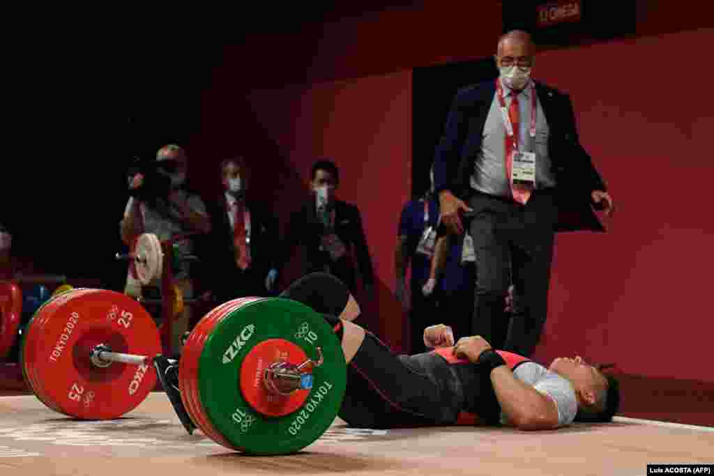 Жапониялык спортчу Тошики Ямомото 200 килону көтөрүүгө аракет кылып, бирок үч жолу тең көтөрө албай калды. Булкуп көтөрүүдө Ямомото 168 килону багындырды. Жыйынтыгында ал 9-орунду ээледи.