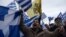 Protesters rally against the use of the term "Macedonia" for the northern neighboring country's name in the northern Greek city of Thessaloniki on January 21.