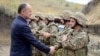 Armenian Defense Minister Seiran Ohanian visits with troops in October.