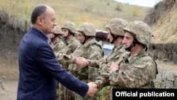Armenian Defense Minister Seiran Ohanian visits with troops in October.