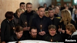 Мартынюк үй-бүлөсүнүн үч баласы орус ракетасынын соккусу маалында каза тапты.