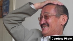 Алым Токтомушев.