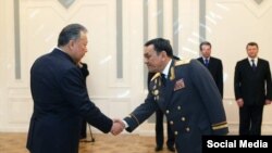 Курманбек Бакиев менен Молдомуса Конгантиев.
