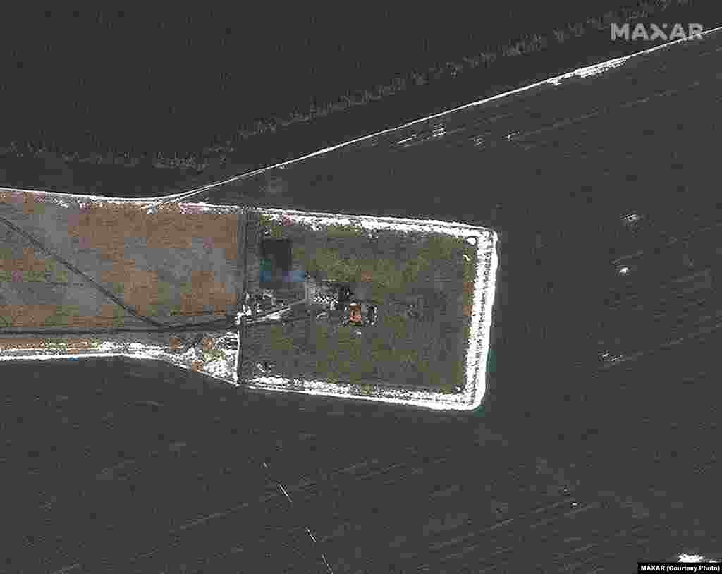 Ошол эле сүрөттүн ири план менен тартылганы.