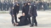 Bosnian police arrest a protester in Tuzla on February 5. 