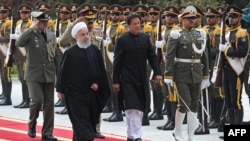 Пакистандын премьер-министри Имран Хан (оңдо) менен Ирандын президенти Хасан Роухани.  Тегеран, 22-апрель, 2019-жыл. 