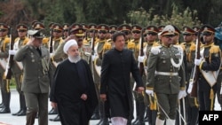 Пакистандын премьер-министри Имран Хан менен Ирандын президенти Хасан Роухани. 22-апрель, 2019-жыл. Тегеран.