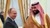 Владимир Путин и саудовский кронпринц Мохаммед Бин Салман в Кремле 14 июня 2018
