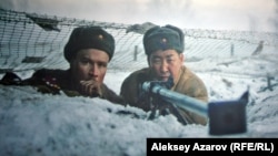 «28 панфиловшы» фильмінен көрініс. Экраннан түсірілген сурет.  