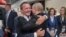 Gerhard Schroeder (left) hugs Russian President Vladimir Putin at the opening of the 2018 FIFA World Cup in Moscow in June 2018.