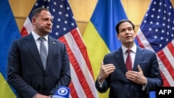 US Secretary of State Marco Rubio (right) and Ukrainian Presidential Office Chief of staff Andriy Yermak hold a press conference following closed-door talks on a US plan to end the war in Ukraine, in Geneva on November 23.