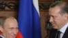 Russia -- Prime Minister Vladimir Putin (L) meets with his Turkish counterpart Recep Tayyip Erdogan in Moscow, 13Jan2010