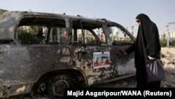 Իրան - Իսրայելի հարվածի հետևանքով այրված շտապօգնության ավտոմեքենա Թեհրանում, 23-ը հունիսի, 2025թ.