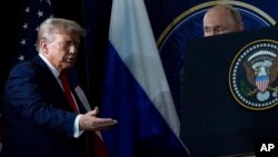 Прэзыдэнт ЗША Дональд Трамп і прэзыдэнт Расеі Ўладзімір Пуцін на сумеснай прэс-канфэрэнцыі ў пятніцу, 15 жніўня 2025 году, на базе Эльмэндорф-Рычардсан, Аляска