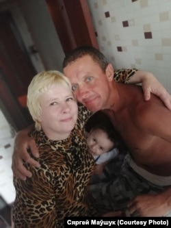 Елена и Сергей Мовшуки с ребенком