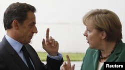 Франция и Германия выступают за солидарность в еврозоне