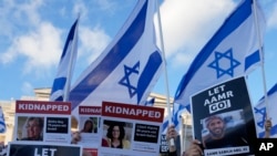 Барымтадагыларды бошотуу талабы коюлган акция. Иллюстрациялык сүрөт. 