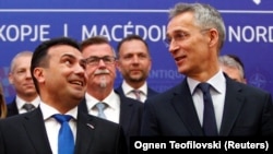 North Macedonian Prime Minister Zoran Zaev (left) and NATO Secretary-General Jens Stoltenberg speak in Skopje on June 3.