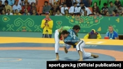 Нурбек Кожобеков жабык имараттагы Азия оюндарында. 22-сентябрь, 2017-ж. 