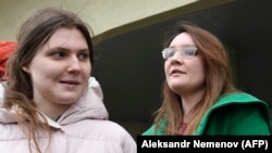 Anna Pavlikova and Maria Dubovik, members of the New Greatness group, have been charged with creating an extremist group. 