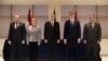 Bosnian presidency Chairman Dragan Covic (center) and members Bakir Izetbegovic (left) and Mladen Ivanic (right) pose for a photo with Croatian President Kolinda Grabar Kitarovic (2nd left) and Serbian President Aleksandar Vucic (2nd right) after talks in Mostar on March 6.