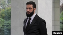 Ахмед аш-Шараа.