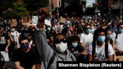 Протест в США после смерти афроамериканца Джорджа Флойда от рук белого полицейского. Нью-Йорк, 15 июня 2020 года.