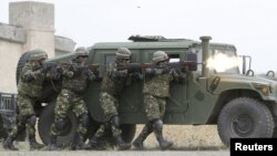 Romanian soldiers take part in Agile Spirit 2015 at the Vaziani military base outside Tbilisi in July 2015.