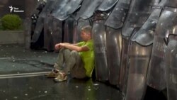 Человек в зеленой майке