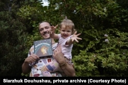 Сяржук Доўгушаў з дачкой, фота з прыватнага архіву