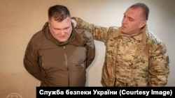 Голова Служби безпеки Василь Малюк під час затримання підозрюваного у держзраді Дмитра Козюри