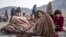 Afghan refugees rest at a camp near the Torkham Pakistan-Afghanistan border crossing in Afghanistan on November 3, 2023. More than half a million Afghans were forced to leave Pakistan when Islamabad announced its plans to expel "undocumented foreigners."